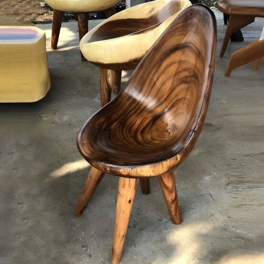 Javanese Art Chair handcrafted from Suar wood with sculptural curves and cultural heritage design – Heavenly Home Furniture