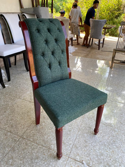 Luxury dining chair with dark mint fabric seat and handcrafted teak frame