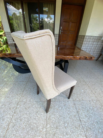 Luxury handcrafted dining chair with high backrest and cushioned seat