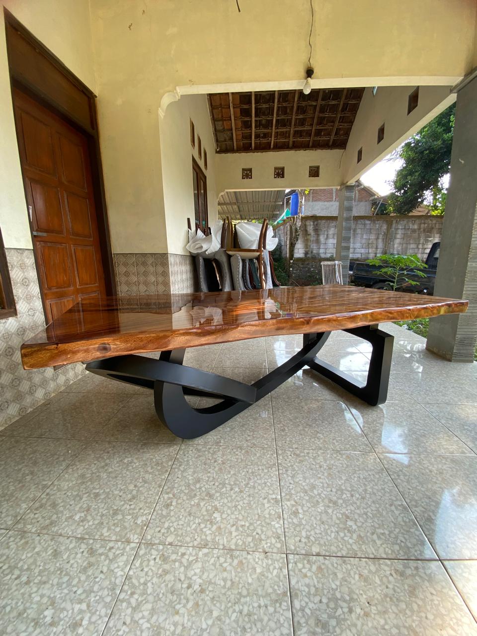 Elegant rustic-modern dining table made from premium Suarwood and resin